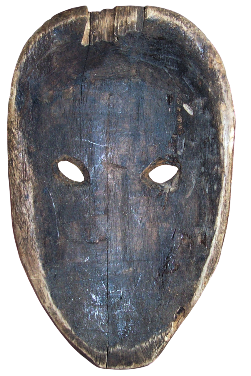 “Hand-carved wooden folk mask – interior view showing hollowed wood, chisel marks, and natural aged patina.”